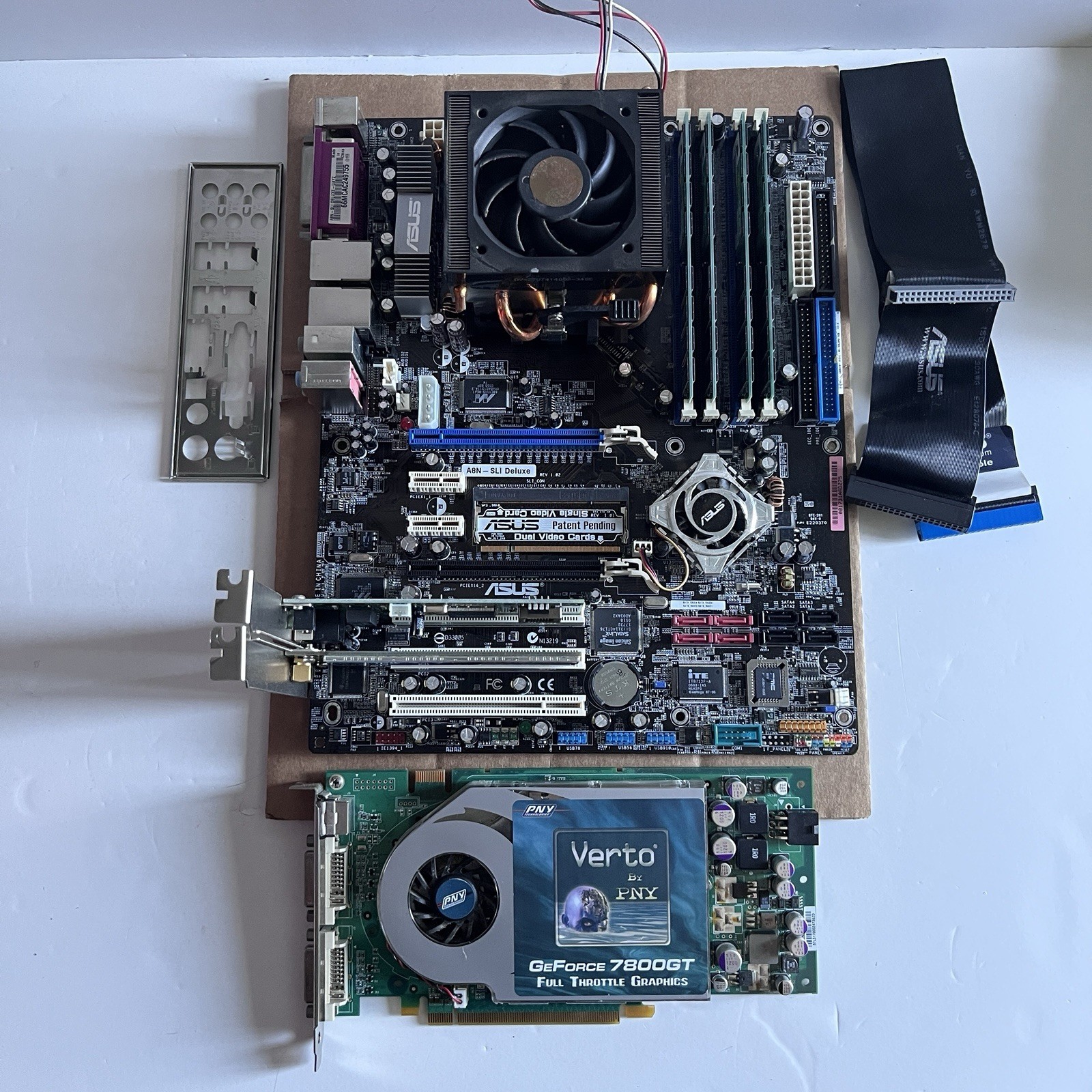 ASUS A8N-SLI Deluxe ATX Socket 939 AMD Athlon 64 X2 PNY 7800GT 2GB RAM READ